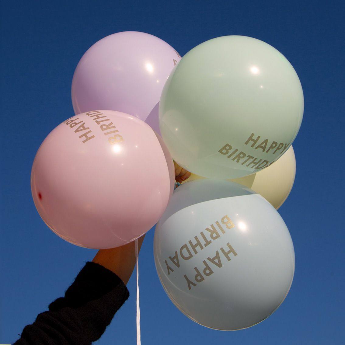 pastel balloons in sky